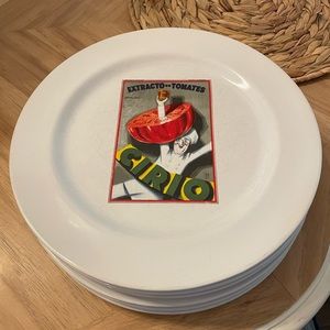 Pottery Barn Vintage Posters collection. Dinner plates and glasses.